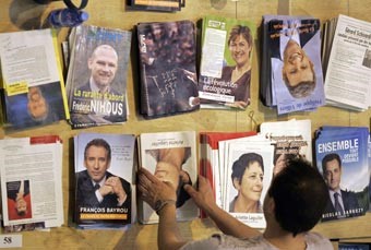 ساركوزي: فرق هائل بيني وبين لوبن