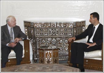 كارتر يجتمع بالرئيس الأسد ومشعل ويرفض نشر صوره مع قادة حماس