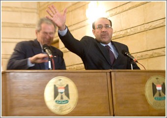 بوش والمالكي وقّعا الاتفاقية الأمنية وأكدا الالتزام بموعد انسحاب القوات