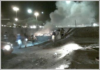 حرق سيارة عمداً في تيماء والنيران تلتهم شقة في السالمية
