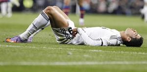 نجم ريال مدريد البرتغالي كريستيانو رونالدو متاثرا بالهزيمةرويترز