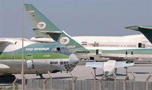 صورة ارشيفية 14 يوليو 2003 تظهر طائرات ركاب تابعة للخطوط العراقية في مطار بغداد بعد ان تم احتجازها بواسطة قوات التحالف