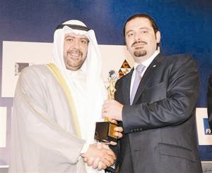 الشيخ احمد الفهد يتسلم جائزة الريادة في الانجاز من رئيس الوزراء اللبناني سعد الحريري﻿﻿محمود الطويل
﻿