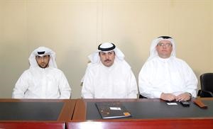 عادل المخيزيم وسعود الايوب خلال الجمعية العمومية اسامة البطراوي
