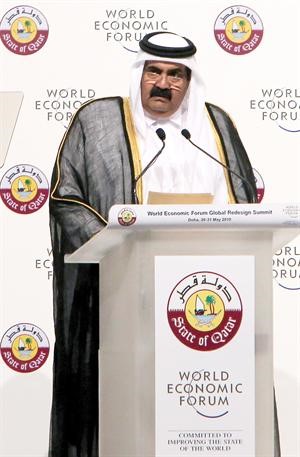 امير قطر الشيخ حمد بن خليفة يلقي كلمة الافتتاح	رويترز﻿