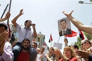 متظاهرون سوريون في دمشق احتجاجا على الاعتداء الاسرائيلي على اسطول الحرية							افپ﻿