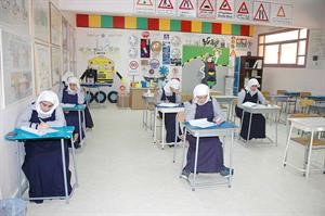 طالبات يؤدين الامتحانات كرم دياب