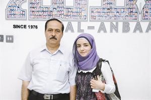 وئام محمد مجني مع والدها﻿