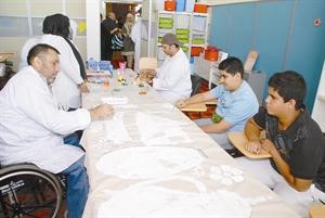 ورشة الفنان ناجي الحاي