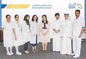 مسؤولو الاهلي مع متطوعي الحملة
