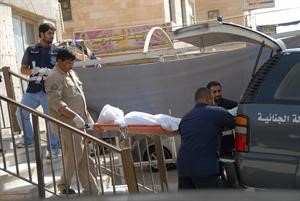 جثة المجني عليها في طريقها الى الطب الشرعي