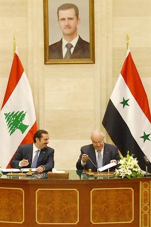 عطري والحريري يوقعان الاتفاقيات بين الحكومتين السورية واللبنانيةمحمود الطويل