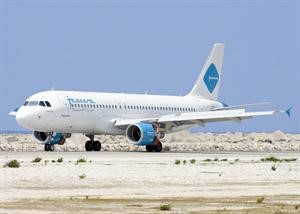 طائرة الجزيرة تستعد للاقلاع الى احدى محطاتها المتعددة﻿