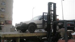 رفع احدى السيارات
