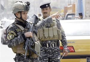 قوات امن عراقية في شوارع بغداد بعد يومين من انتهاء الاعمال القتالية الاميركية الرسمية		افپ﻿