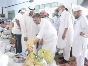 وفد الهيئة يشرف على توزيع مساعدات على المنكوبين﻿