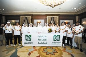 فريق العلاقات العامة بـبيتك يتوسط ابطال العالم وجانب من تكريم احد اللاعبين﻿