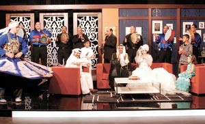 ندى فاضل واحمد العونان بملابس العرس في برنامج سوالف