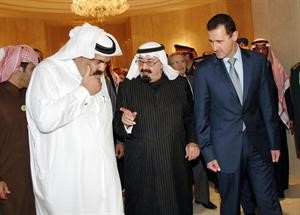 صورة ارشيفية للزعماء الثلاثة خادم الحرمين الشريفين الملك عبدالله بن عبدالعزيز وسمو امير قطر الشيخ حمد بن خليفة ال ثاني والرئيس السوري دبشار الاسد