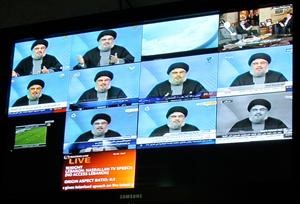 امين عام حزب الله على شاشات المحطات اللبنانية والعربية خلال المؤتمر الصحافي الذي عقده مساء امس	افپ﻿