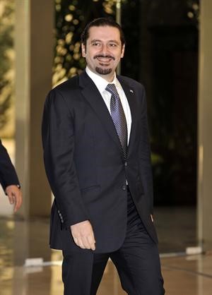 رئيس حكومة تصريف الاعمال سعد الحريري مبتسما لدى دخوله قصر بعبدا﻿