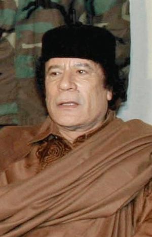 الزعيم الليبي العقيد معمر القذافي﻿