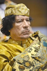 الزعيم الليبي معمر القذافي﻿