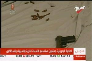 صورة عن التلفزيون لاحد الاسلحة التي ضبطت في خيام المتجمهرين في دوار اللؤلؤة امس