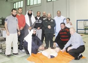 الطحان مع اعضاء الهيئة التدريبية في قسم الاعمال الميكانيكية بعد الدورة التدريبية﻿