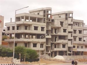 الحكومة تقرّ مشروع قانون التعاون السكني الجديد