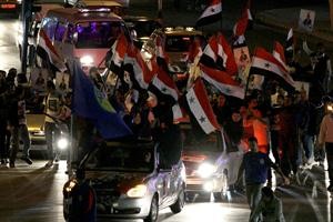 مظاهرات مؤيدة للرئيس السوري في شوارع دمشق امس 		افپ﻿