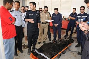 جثة الاطفائي في طريقها الى الطب الشرعي
