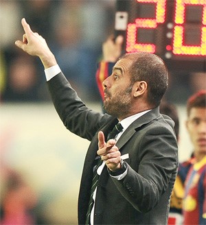 غوارديولا قاد برشلونة للصدارة بفارق 8 نقاط عن الريال