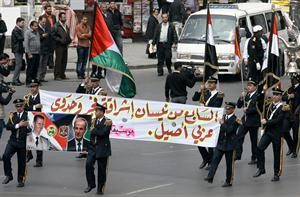 فرقة موسيقى الجيش تقدم عرضا بمناسبة ذكرى تاسيس حزب البعث في احد شوارع دمشق امس 	افپ﻿