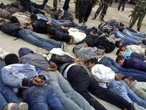 صورة وزعتها افپ ماخوذة عن الانترنت لقوات امن لدى اعتقالها عددا من رجال قرية البيضا افپ