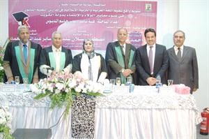 هبة الدبوس مع لجنة المناقشة ناصر عبدالسيد
