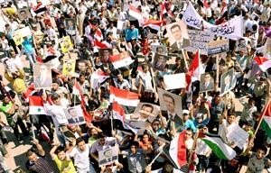 واخرون خرجوا في مسيرة تاييد للاسد في حلب اپ