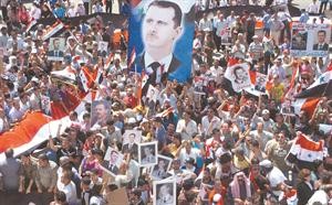 صورة وزعتها سانا لمسيرة مؤيدة للرئيس بشار الاسد في بلدة ازرع في درعا افپ