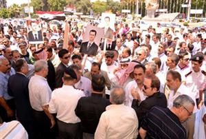 صورة وزععتها سانا لمظاهرات مؤيدة للرئيس بشار الاسد ﻿