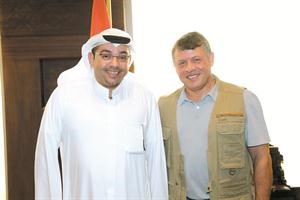 العاهل الاردني الملك عبدالله الثاني مع رئيس التحرير الزميل يوسف خالد المرزوق﻿
