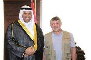 العاهل الاردني مع رئيس تحرير جريدة كويت تايمز الزميل عبدالرحمن العليان﻿