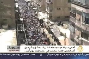 صورة عن الانترنت لاحدى جنازات قتلى الجمعة في مدينة دوما 