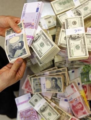 «الوطني»: أداء متباين في أسواق العملات الأجنبية 