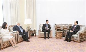 الرئيس السوري بشار الاسد مستقبلا وزير الخارجية اللبناني عدنان منصور بحضور المعلم وشعبان	افپ﻿