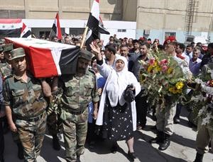 تشييع الكولونيل عبدالكريم مخلوف الذي قتل على يد جماعات مسلحة كما وصفتهم سانا افپ
