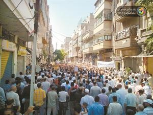 صورة عن الانترنت لمظاهرة في حمص امس افپ