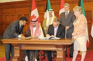 جانب من توقيع اتفاقية تشجيع وحماية الاستثمار بين الكويت وكندا
