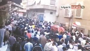 صورة عن الانترنت لتشييع احد القتلى في ضاحية حرستا بدمشق
