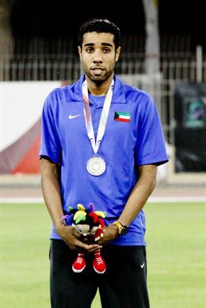 عبدالعزيز المنديل متوجا بالميدالية الفضية