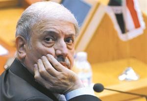 مندوب سورية بالجامعة العربية يوسف الاحمد خلال الاجتماع الوزاريرويترز﻿